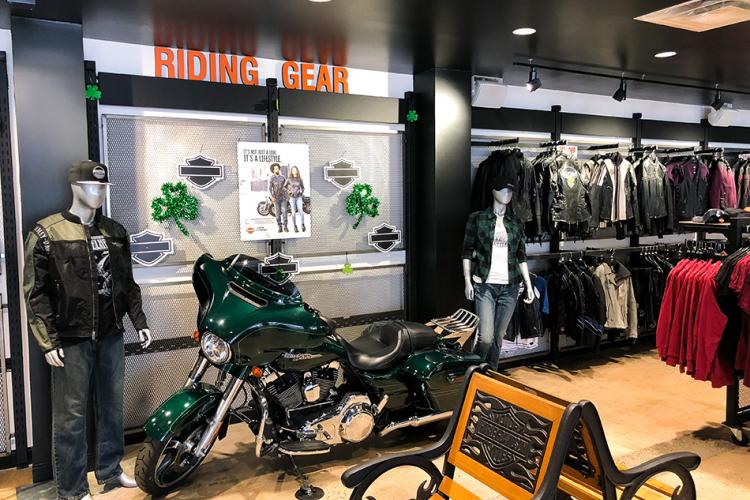 Motorcycle in clothing retail space